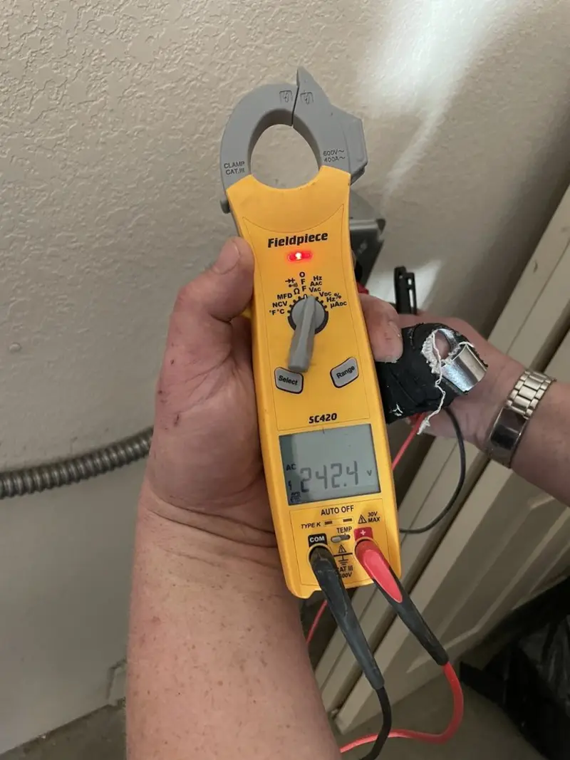 Voltage testing with clamp meter during Aluminum Wiring Replacement in Irwin